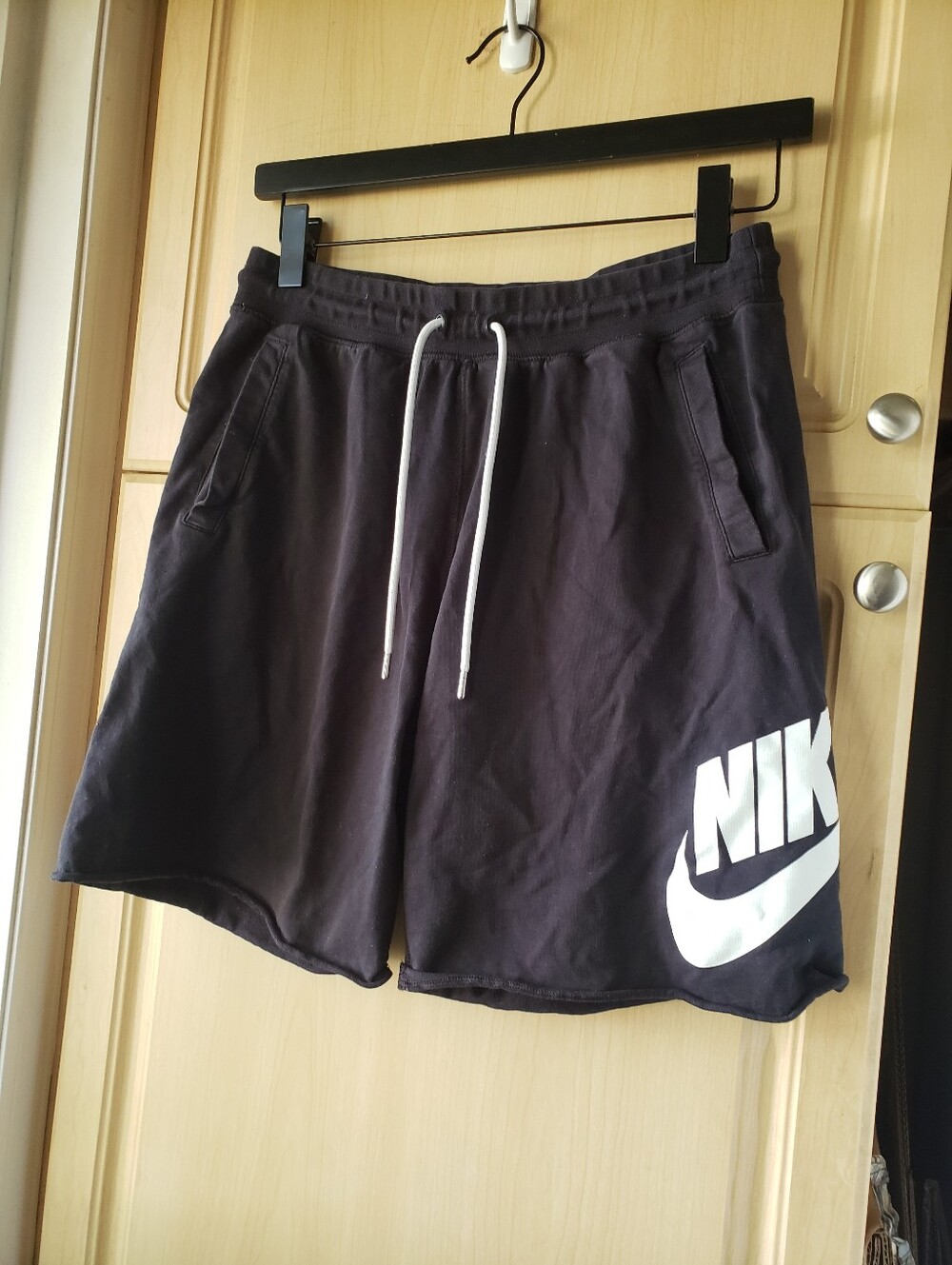 Nike Black Athletic Shorts with White Swoosh